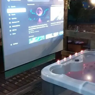 The Cabin with optional Hot Tub Projector DEPOSIT REQUIRED FOR PROJECTOR