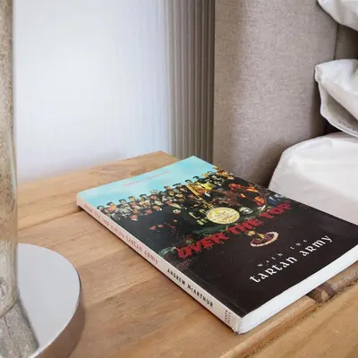 a book sitting on top of a table at Iona in Stirling