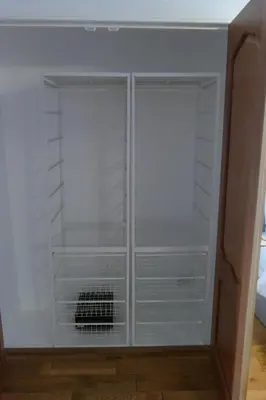 a white refrigerator with its doors open in a room at The Annexe at Loch View Farm in Crieff