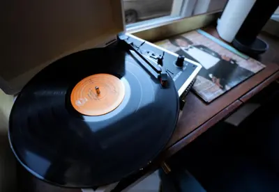 a vinyl record sitting on top of a table at Boutique 50 in Glasgow