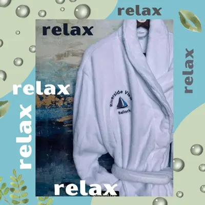 a picture of a white hoodie with an eye on it at Riverside View Apartment in Balloch, Loch Lomond in Balloch
