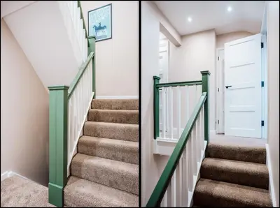 a staircase in a house with green railings at Dalmarnock Stay in Glasgow