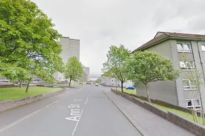 an empty street in a city with buildings and trees at Central 1-Bed Apt Sleeps 4 5 mins to Station in Greenock