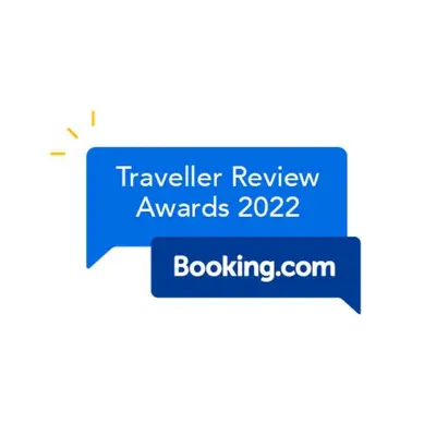 a blue speech bubble with the text travel review awards at The Cochno Flat, Clydebank in Dalmuir