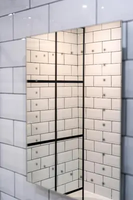 a bathroom with white tiled walls and a mirror at Cheerful 2 Bedroom Homely Apartment, Sleeps 4 Guest Comfy, 3x Double Bed, Parking, Free WiFi, Suitable For Business, Leisure Guest,Glasgow, Glasgow West End, Near City Centre, Perfect For Common Wealth Games 2026 in Glasgow