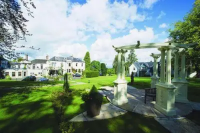 a gazebo in the middle of a yard at Ryder Cup Lodge Duchally - Free access to Leisure Club Swimming Pool Hot Tub Steam Room - Starlink Satellite Internet - Sky Glass Now DOG FRIENDLY for 2025 in Auchterarder