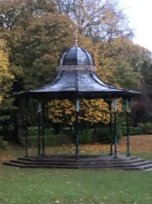 a gazebo in the middle of a park at Traditional apt close to city centre & Hampden in Glasgow