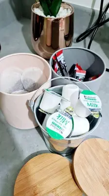 a bowl of marshmallows and a bowl of toothpaste on a counter at Stylish 2 bedroom Apartment / FREE Gated Parking in Glasgow