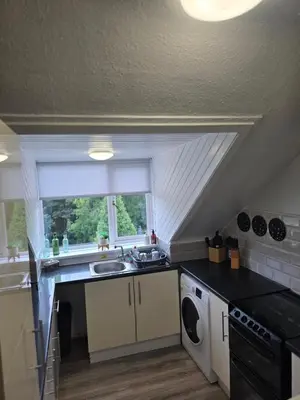 a small kitchen with a sink and a window at Castleblair Snug - Entire Flat in Dunfermline in Dunfermline