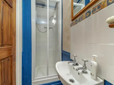 a bathroom with a sink and a shower at The Bothy - Uk37414 in Bunessan