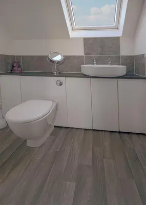 a bathroom with a toilet and a sink at Castle View - Home from Home in Stirling