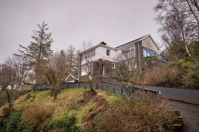 a house on top of a hill at Seòmar Beag in Oban