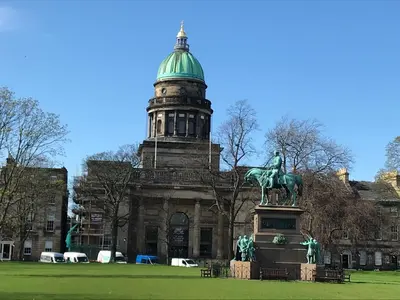 a building with a statue in front of it at Edinburgh Deluxe Duplex with Garage in Edinburgh