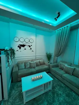 a living room with a couch and a table at 3 bed apartment in the heart of westend of Glasgow in Glasgow