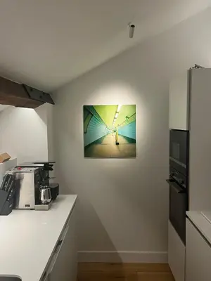 a kitchen with a light on the wall at The Church Tower in Crieff