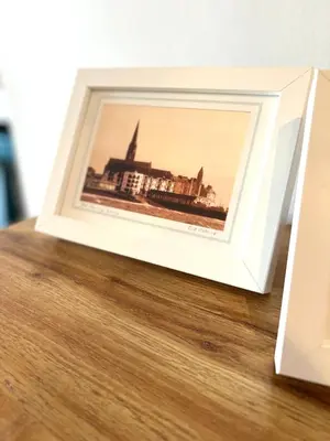 a picture of a building sitting on a table at Bellevue Apartment in Largs