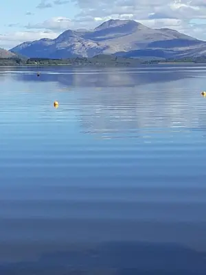 a large body of water with mountains in the background at Annfield House, Callander in Callander