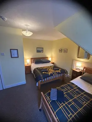 a hotel room with two beds in a room at the CITY- Braveheart House in Edinburgh