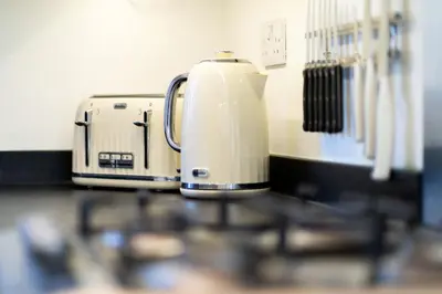 a toaster sitting on top of a kitchen counter at Lagnaha Cottage in Kentallen