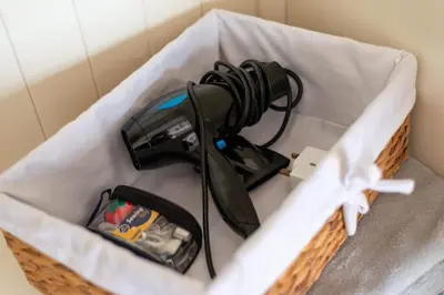 a camera in a basket on a table at Charming Grassmarket 1 Bed Castle pad in Edinburgh