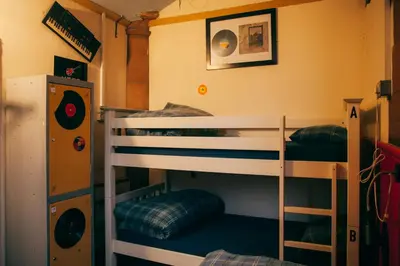 a bunk bed room with two bunk beds at Belford Hostel in Edinburgh