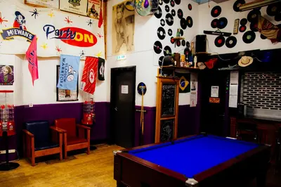 a bar with a pool table in a room at Belford Hostel in Edinburgh