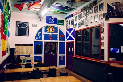 a man sitting at a table in a restaurant at Belford Hostel in Edinburgh