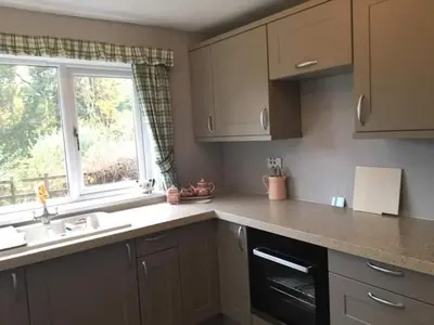 a kitchen with a sink and a window at Pinetree Cottage, dog friendly, Holiday let, Callander Invertrossachs in Callander