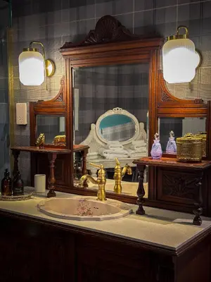 a bathroom with a sink and a mirror at Glencruitten House in Oban