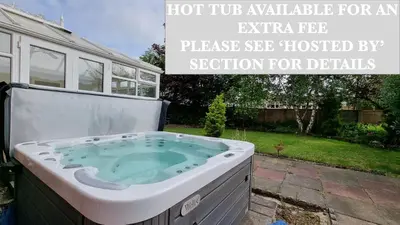a hot tub available for an extra fee increase septic blocked by selection for details at Rozelle Villa in Ayr