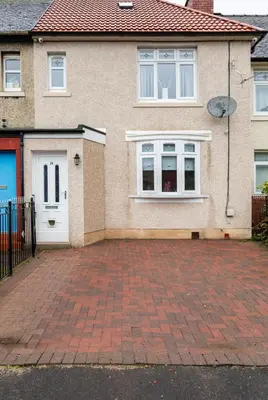 a brick driveway in front of a house at Captivating 3 bedroom home with conservatory in Hamilton