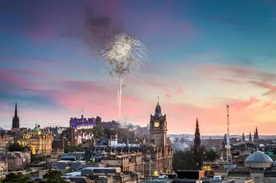 a city skyline with a clock tower and big ben at Superb 1 Bed Flat in Traditional Victorian Building - Pass the Keys in Edinburgh