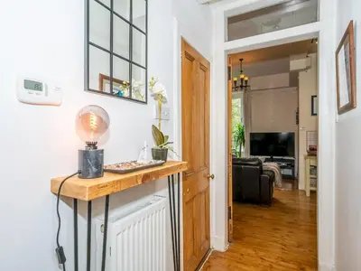 a room with a counter with a light on it at Superb 1 Bed Flat in Traditional Victorian Building - Pass the Keys in Edinburgh