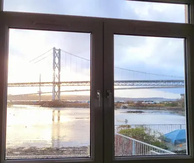 a view of a bridge from a window at Three Bridges Waterfront in North Queensferry