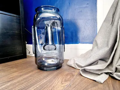 a glass jar sitting on top of a wooden floor at Three Bridges Waterfront in North Queensferry