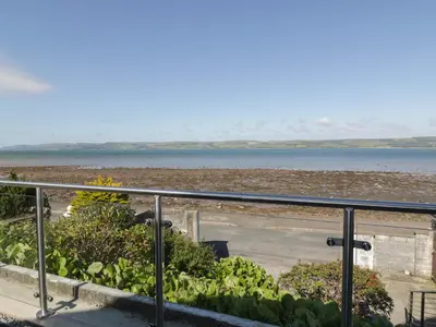 a view of the beach and the ocean at Waters Edge in Stranraer