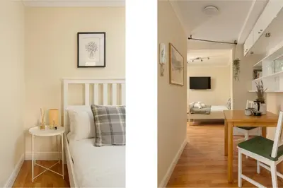 a bedroom and a living room with a bed and a table at Dean Village Hideaway by Calton Living in Edinburgh
