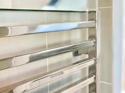 a pair of stainless steel ovens in a kitchen at Clyde Villa in Glasgow