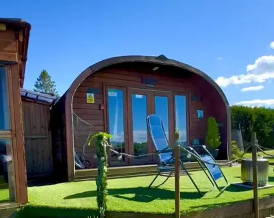 a igloo house with chairs and a cactus at FINN VILLAGE - Loch Lomond Sunset Glamping Pod - Private Ofuro HOT TUB in Drymen
