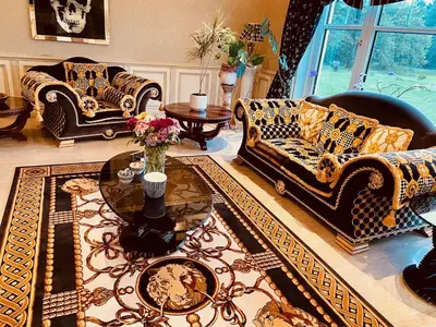 a living room with couches and a coffee table at FINN VILLAGE Loch Lomond Villa - THE BLACK ROOM with Private Jacuzzi-Style Bath in Drymen