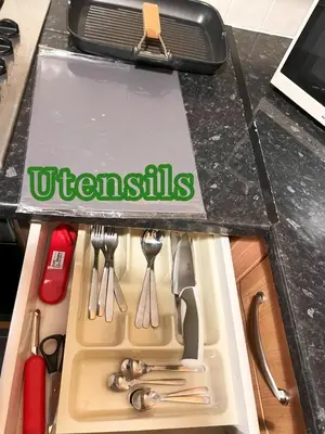 a kitchen sink in a box with utensils at 2 Bedrooms Entire Apartment Self Check in in Fife