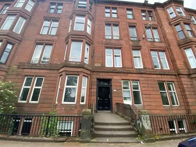 a red brick building with a staircase in front of it at West End Studio Kelvingrove Park Museum - Pass the Keys in Glasgow