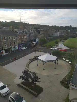 a pavilion in a parking lot in a city at Castleview is a lovely flat in a listed building in Rothesay