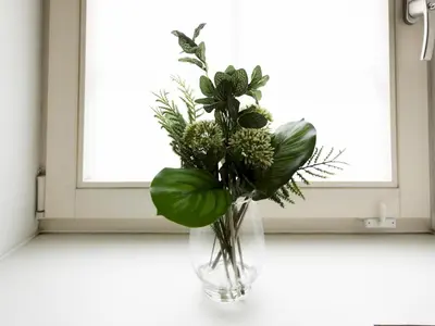 a vase filled with plants on a window sill at Beautiful Unique 3Bed Mews Cottage House - Pass the Keys in Glasgow