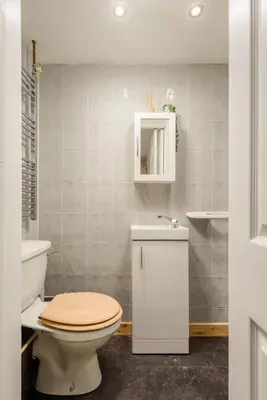 a bathroom with a toilet and a sink at Central Studio Near Usher Hall & Edinburgh Castle in Edinburgh