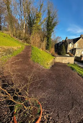 a dirt road in a yard with a house at Dairsie Sea View in Rothesay