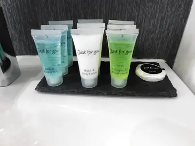 a group of four plastic cups sitting on a table at Charming 2 bed apt close to City and SEC Hydro in Glasgow