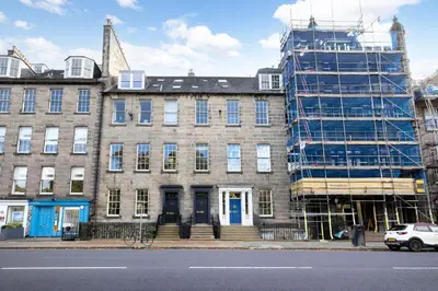 a building under construction with scaffolding around it at JOIVY Contemporary Flat in the New Town in Edinburgh