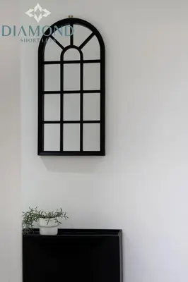 a black framed window picture on a white wall at Cosy 2 Bed Apt West End Edinburgh FREE PARKING in Edinburgh