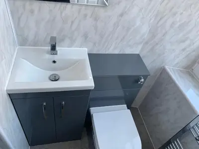 a bathroom with a sink and a toilet at Ibrox Argyll Inn in Glasgow